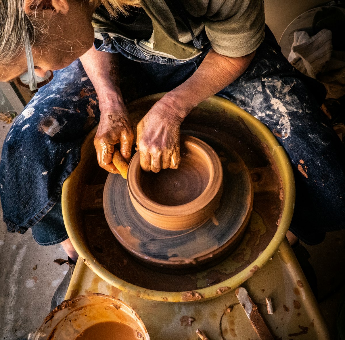 At the pottery wheel